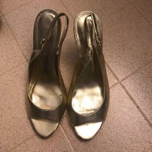 Aldo gold peep toe with sling back heels. Size 8